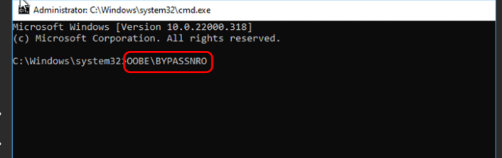 Command Prompt window open during Windows 11 setup, showing the text “OOBE\BYPASSNRO” entered to bypass network requirements.