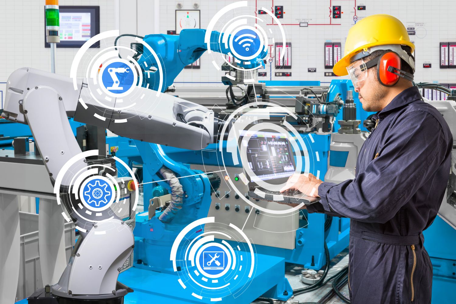 A factory worker analyzing data