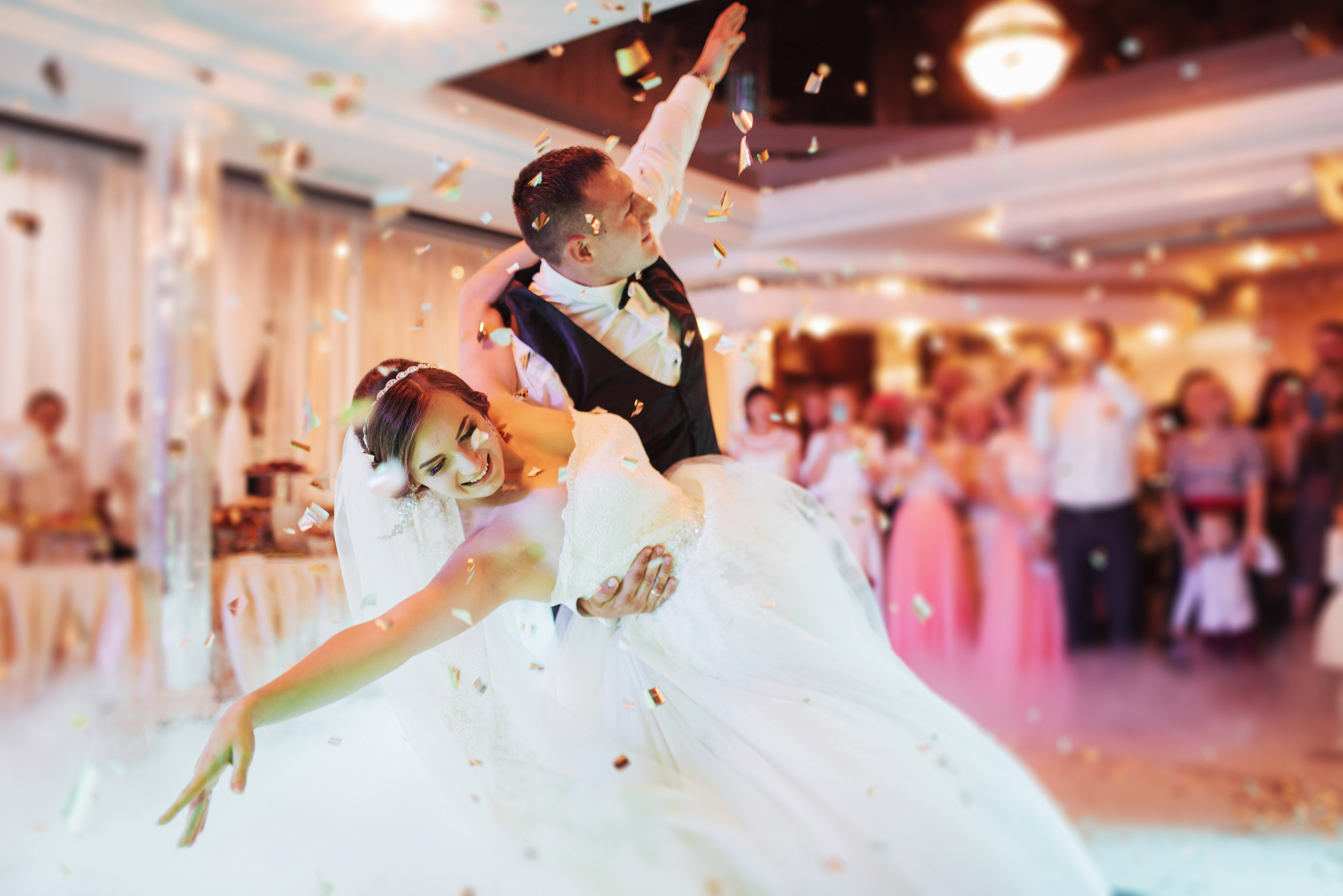 Newlywed couple enjoying their first dance