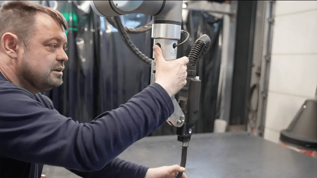 Alusteel Cobot Case Story 1 Welder operating SmoothTool at Alusteel