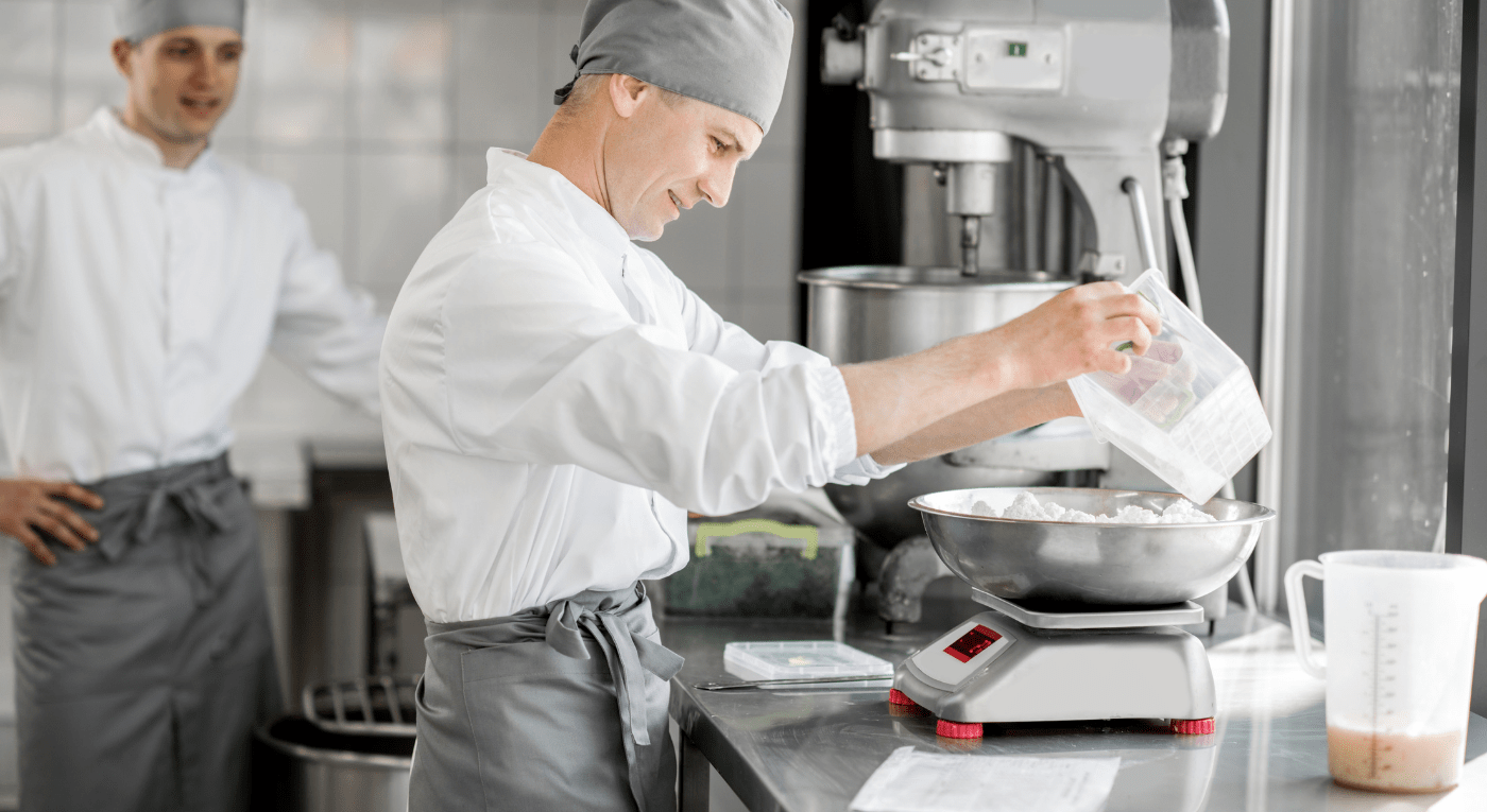 Chef using bakery machines , SNB Bakery Solutions , Bakery Equipment