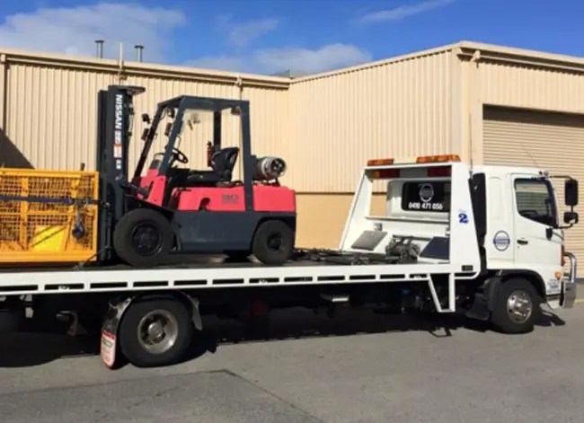 Heavy equipment transport near me