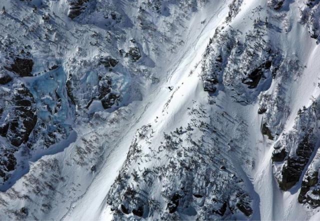 A skier makes his way down the Left Gully, a backcountry ski run with a 40-degree pitch, Saturday, March 30, 2013, on Mt. Washington in New Hampshire. The mountain is considered to be the birthplace of backcountry skiing in the East, providing skiers with some of the most challenging terrain in the country. (AP Photo/Robert F. Bukaty)