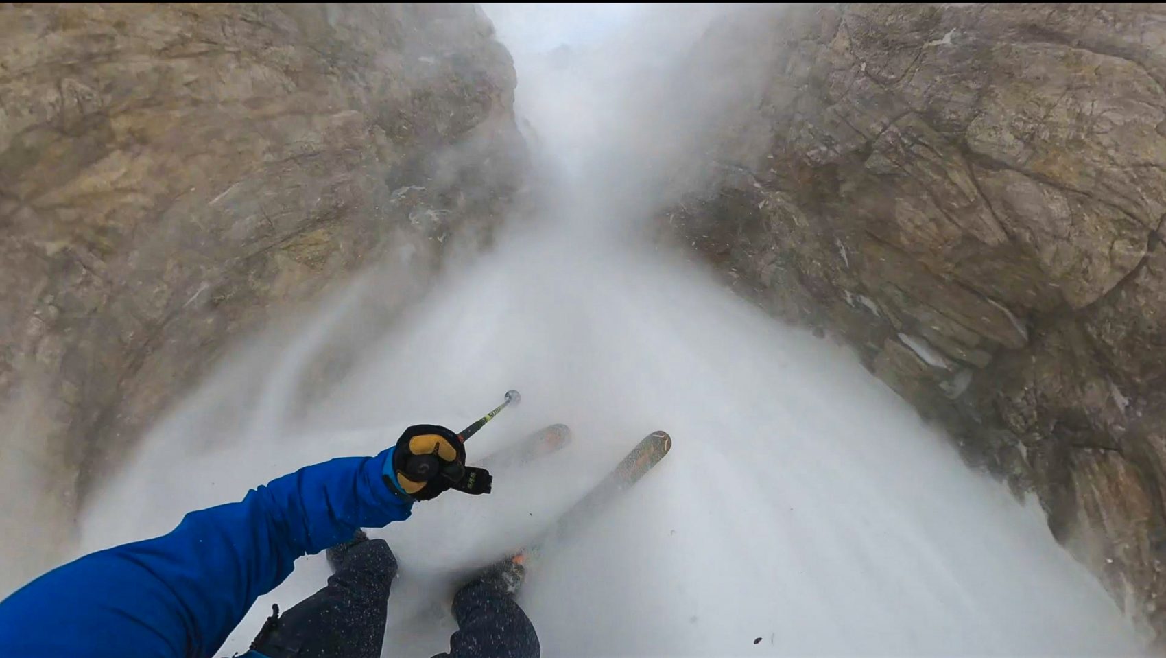 Miles Clark skiing down in the chaos of Terminal Couloir. | Photo: SnowBrains