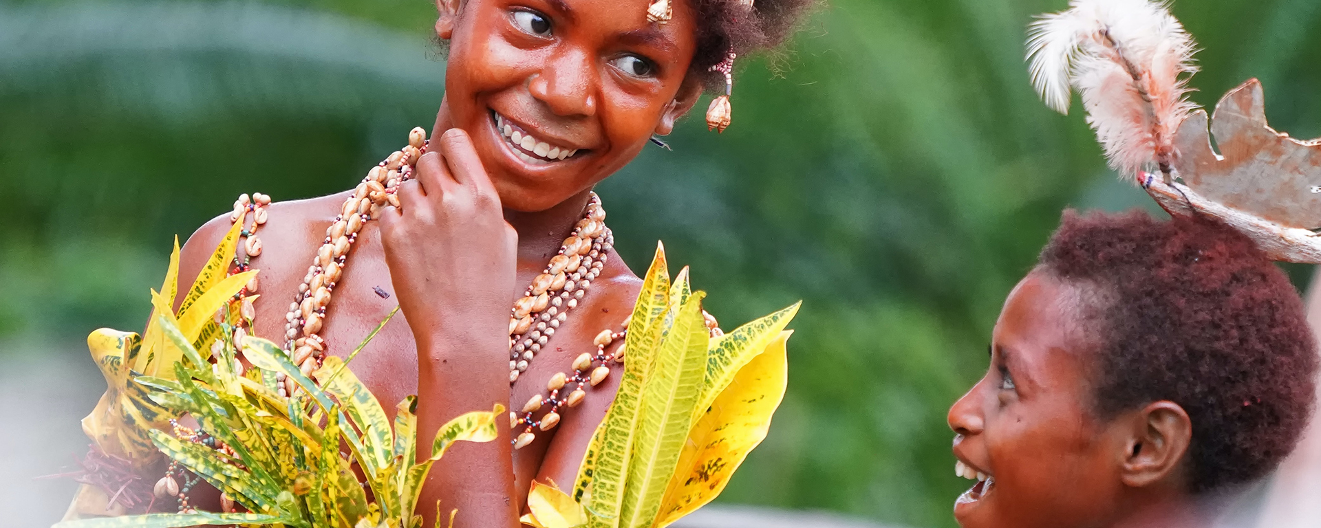 Two young Black girls Performers in a Sing Sing in Papua New Guinea