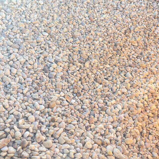 A close up of some rocks on the ground