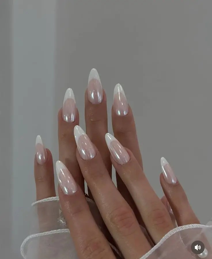 Long almond nails with pearlescent chrome French tips.