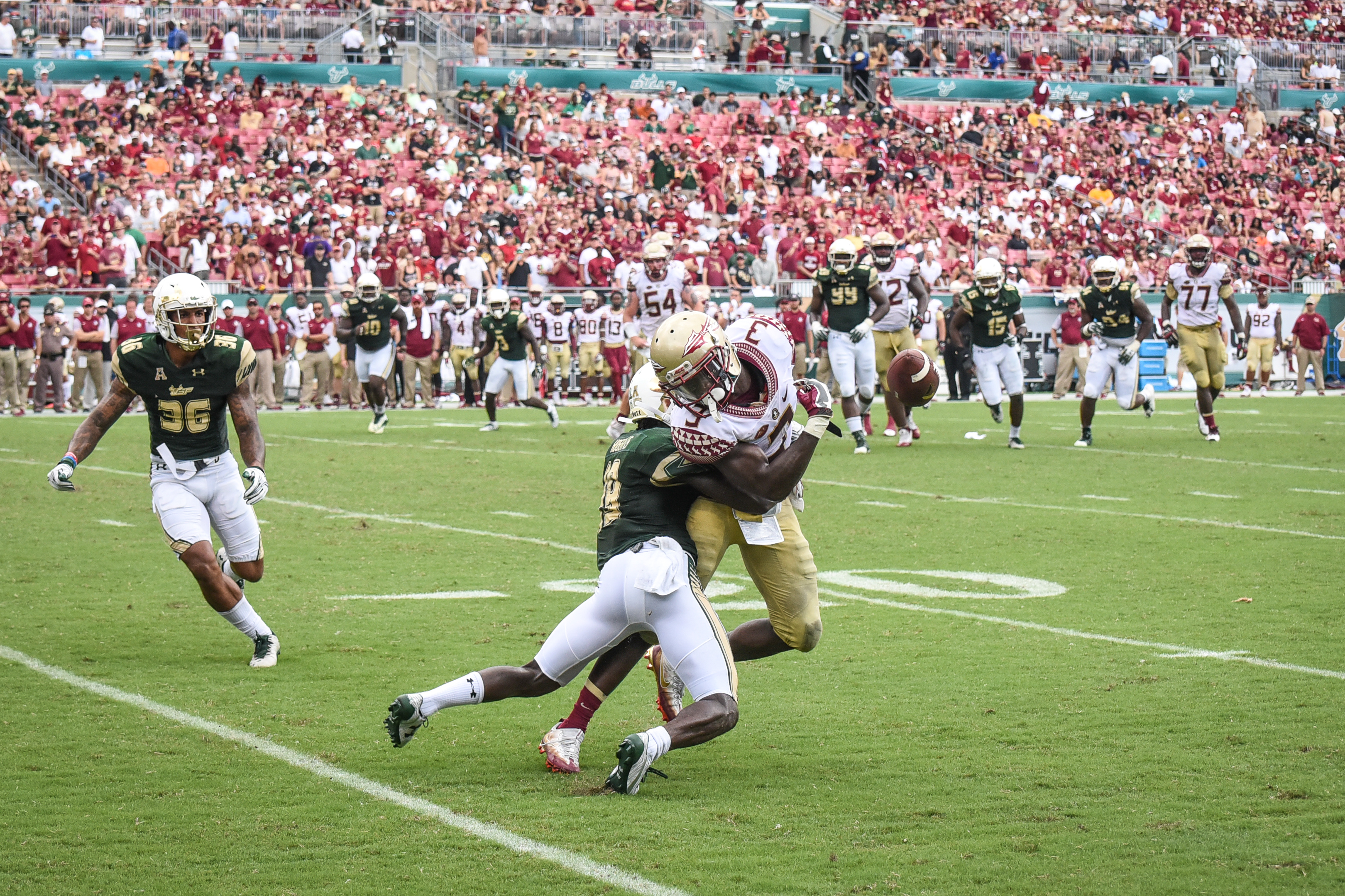 FSU vs USF 2016 103 - Ronnie Hoggins tackles Jesus 'Bobo' Wilson with Nate Godwin 2 by Dennis Akers (3240x2160)