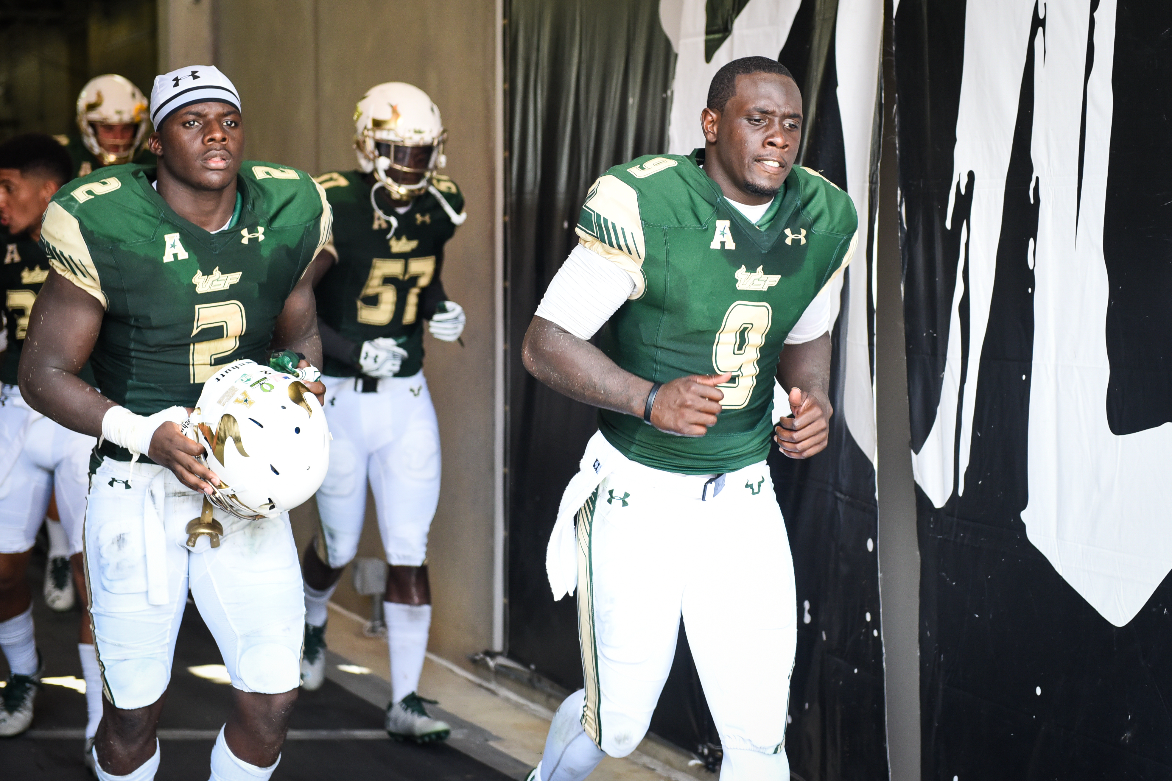 FSU vs USF 2016 81 - Quinton Flowers Nigel Harris D'Ernest Johnson exit the Tunnel by Dennis Akers (3935x2623)