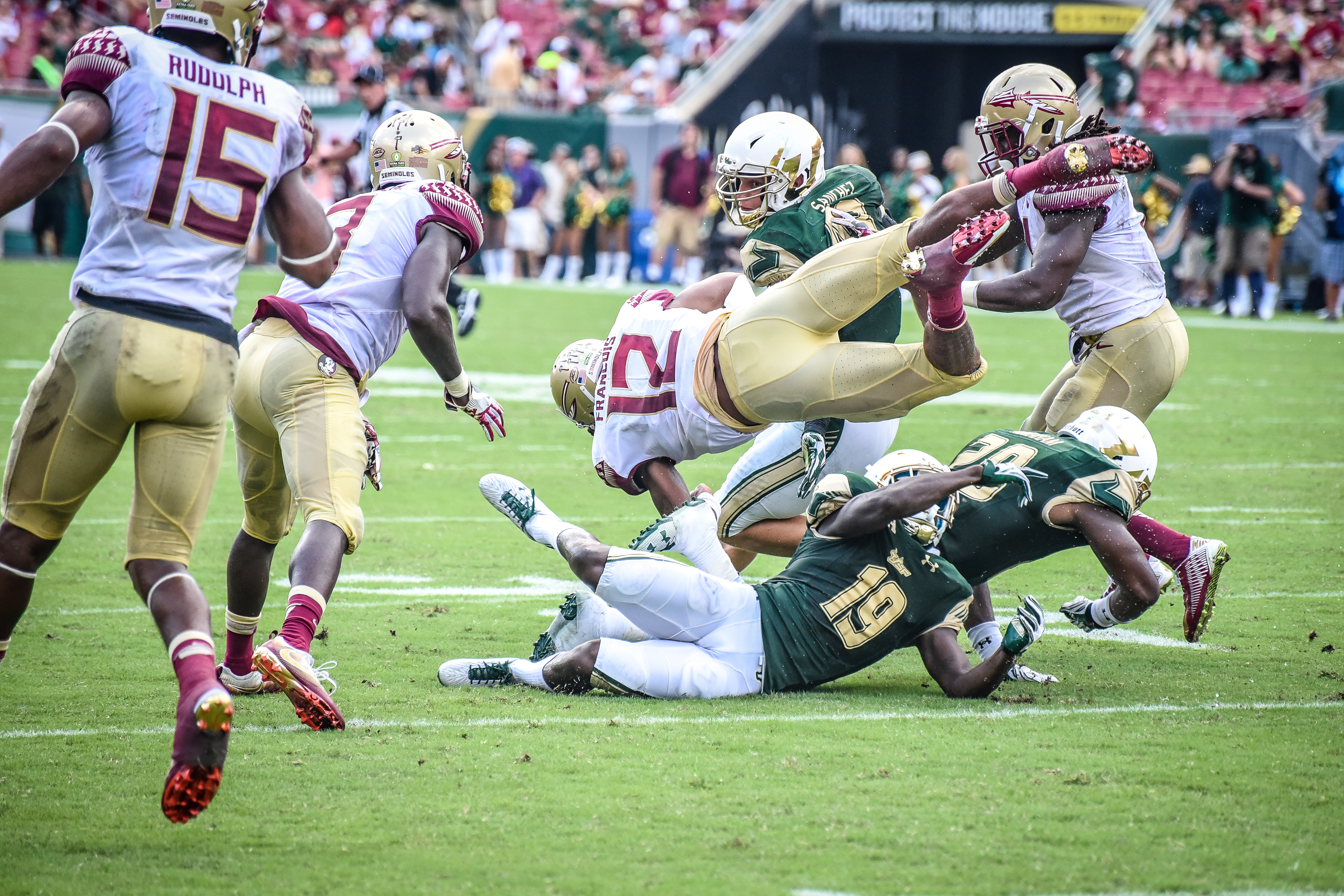 FSU vs USF 2016 88 - Travis Rudolph rushes up field Auggie Sanchez Ronnie Hoggins Devin Abraham by Dennis Akers (4512x3008)