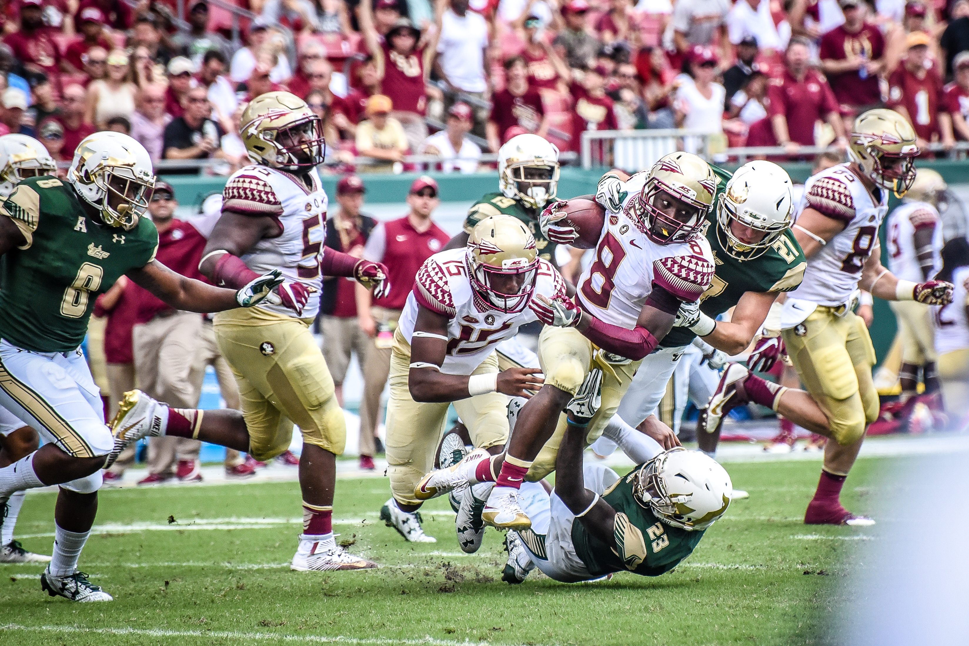 FSU vs USF 2016 97 - Kermit Whitfield tackled by Mazzi Wilkins and Austin Hudson by Dennis Akers (3296x2197)