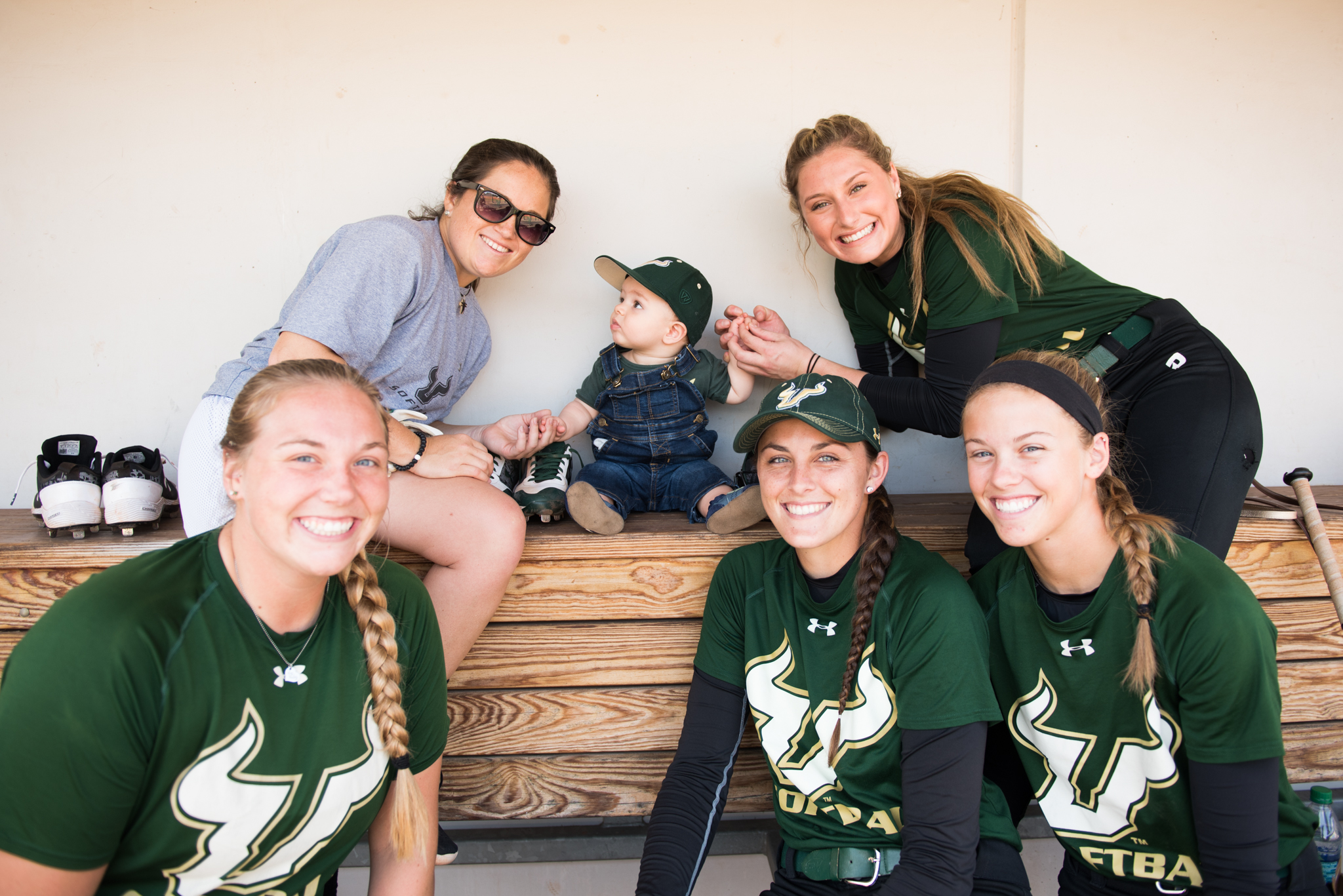 2017 USF Bulls Softball Players Greeting Sonny Akers in dugout by Dennis Akers | SoFloBulls.com