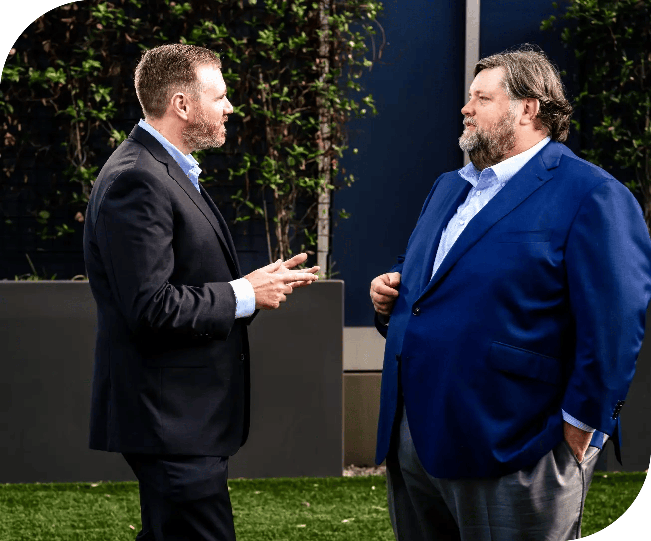 John Kivus and Christopher Jackson in conversation outdoors
