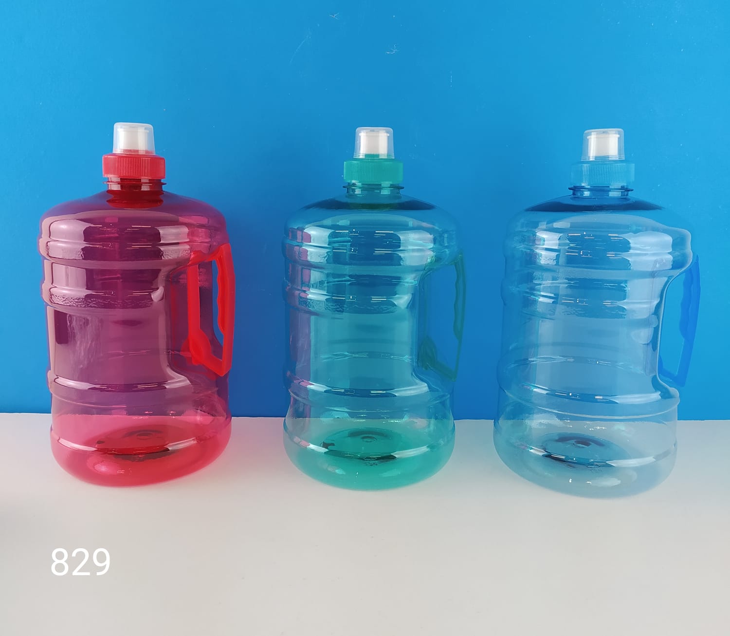 Botella deportiva 2 L galón, 4 colores surtidos