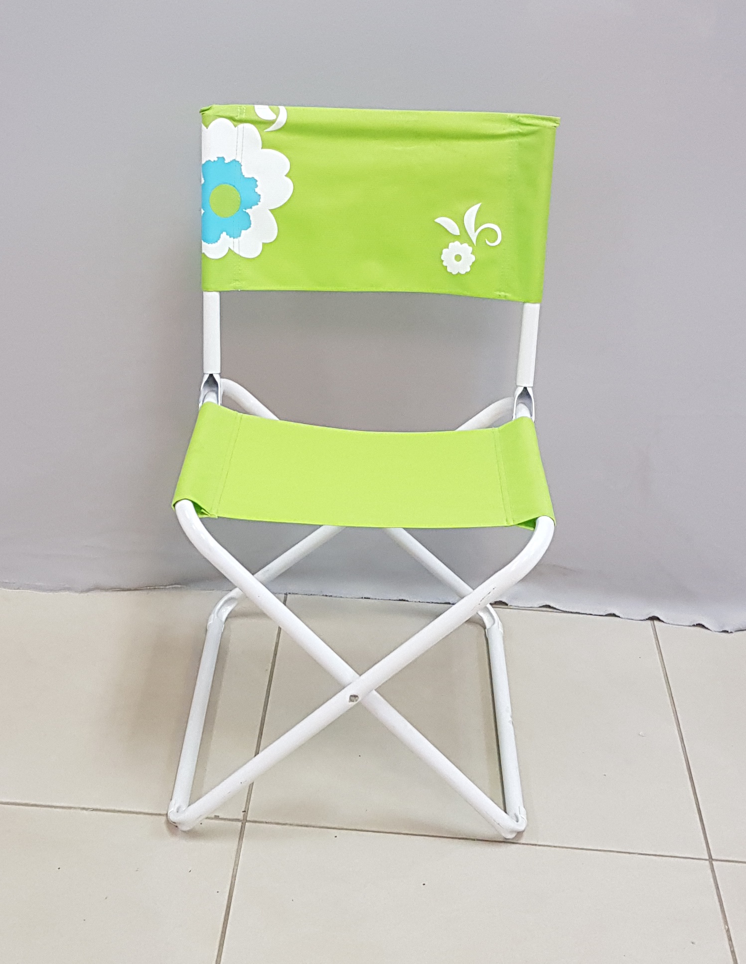 Silla de playa con tela estampada, verde y celeste surtidas