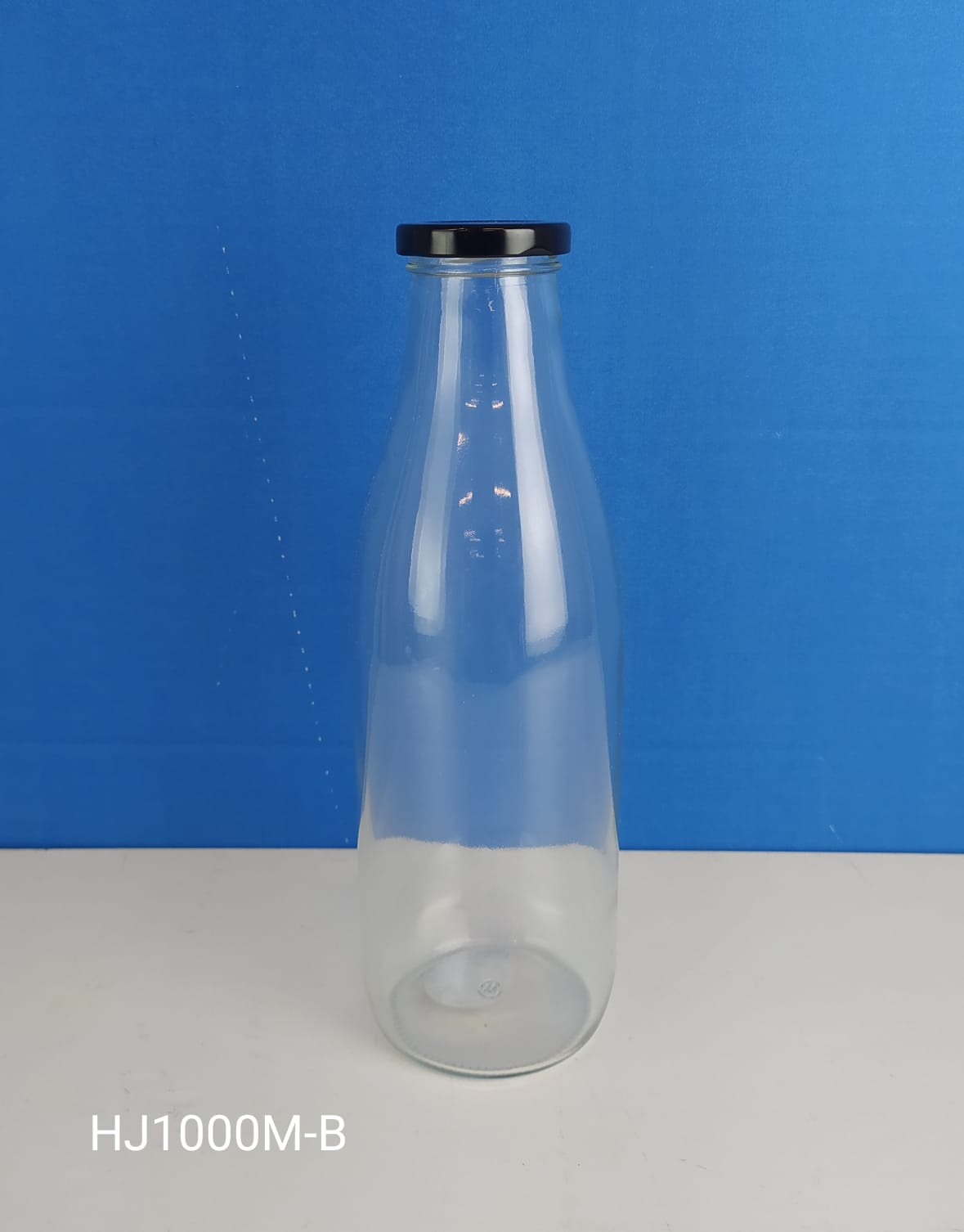 BOTELLA VIDRIO 1L TAPA NEGRA