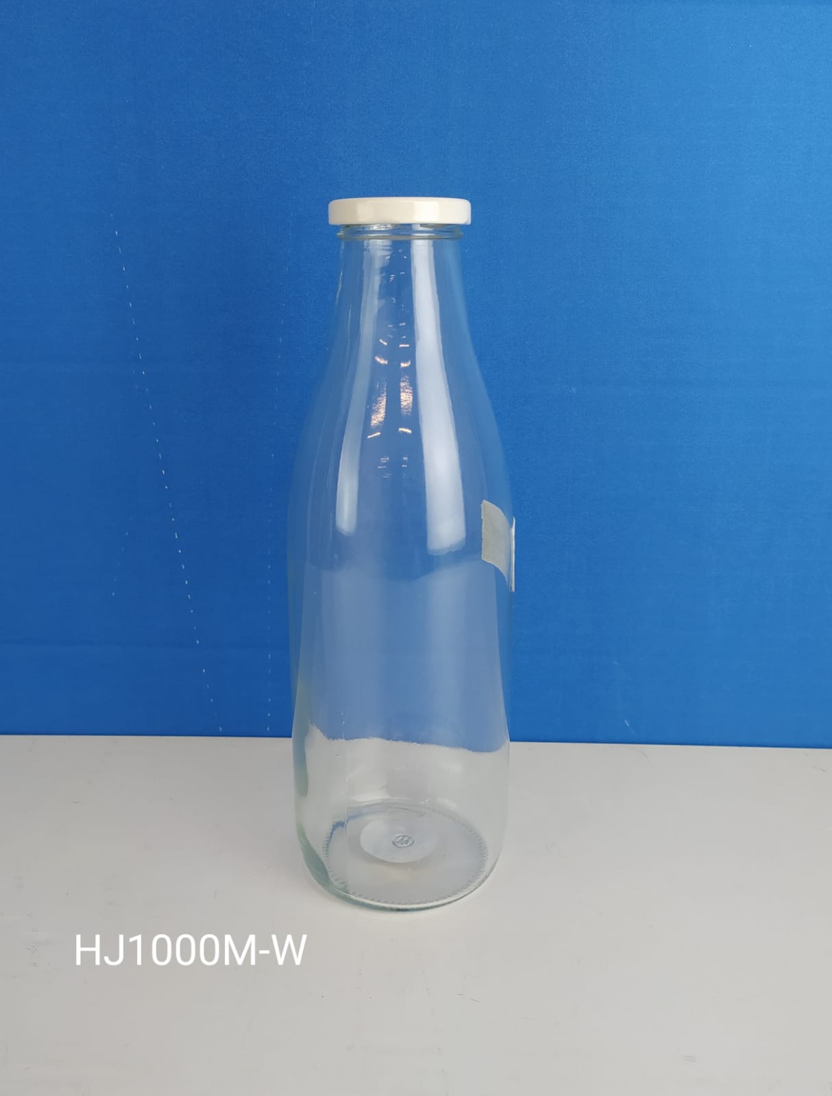 BOTELLA VIDRIO 1L TAPA BLANCA