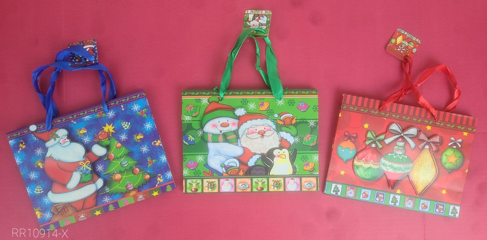 Bolsa de regalo navideña de papel 18 x 23 x 8 cm, surtida