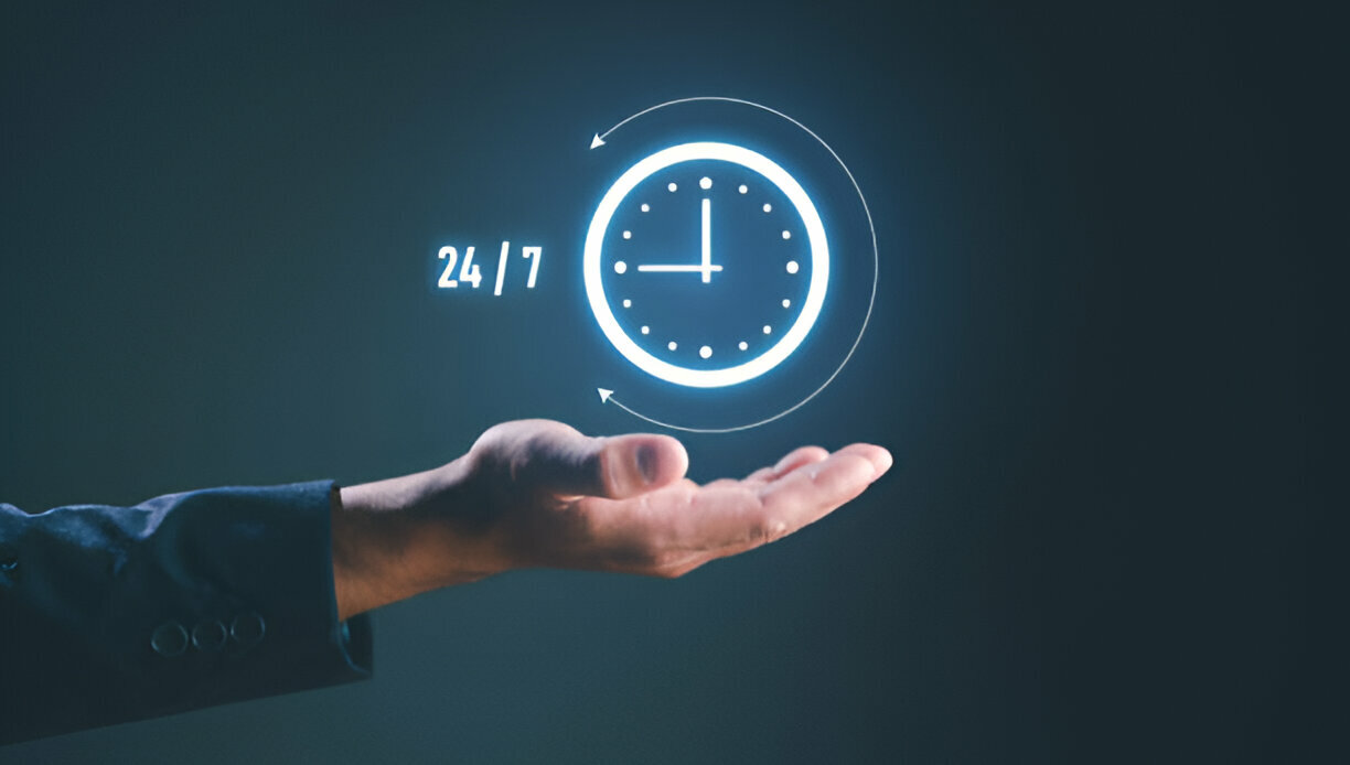 A man's hand is showing and the clock is over it