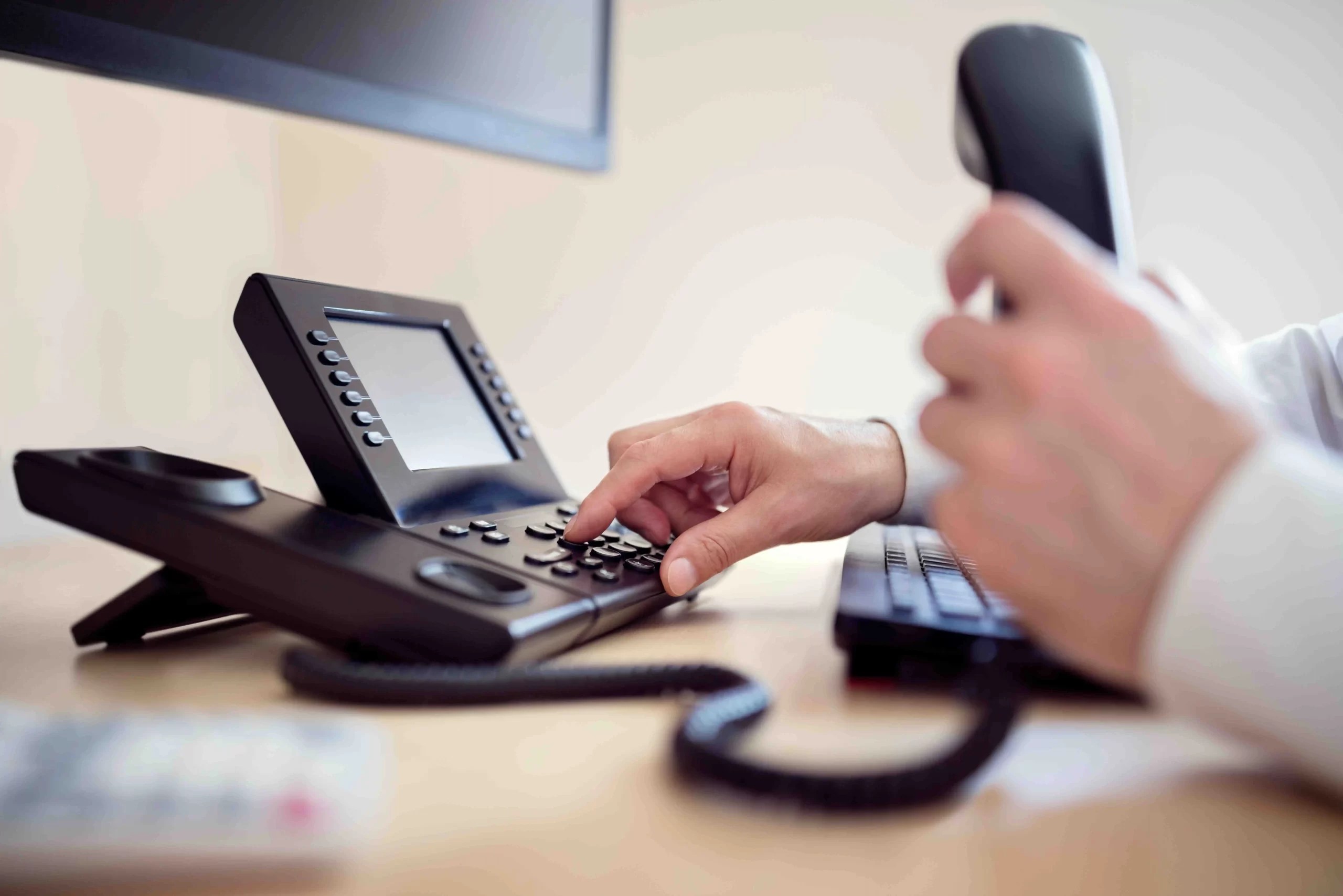 Black-colored PBX phone system installed by Solo Soft Solutions