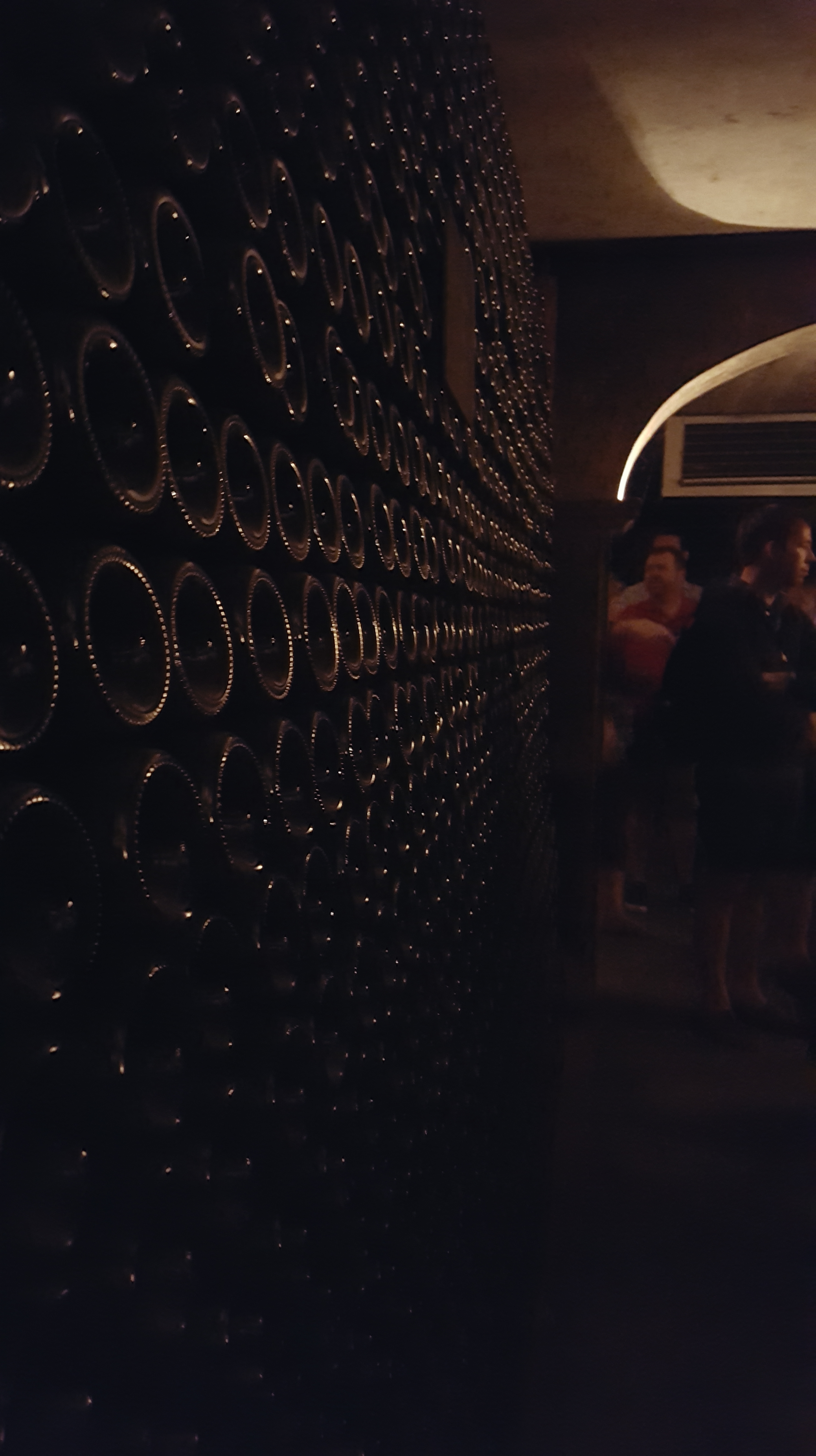 Thousands of hand stacked bottles.
