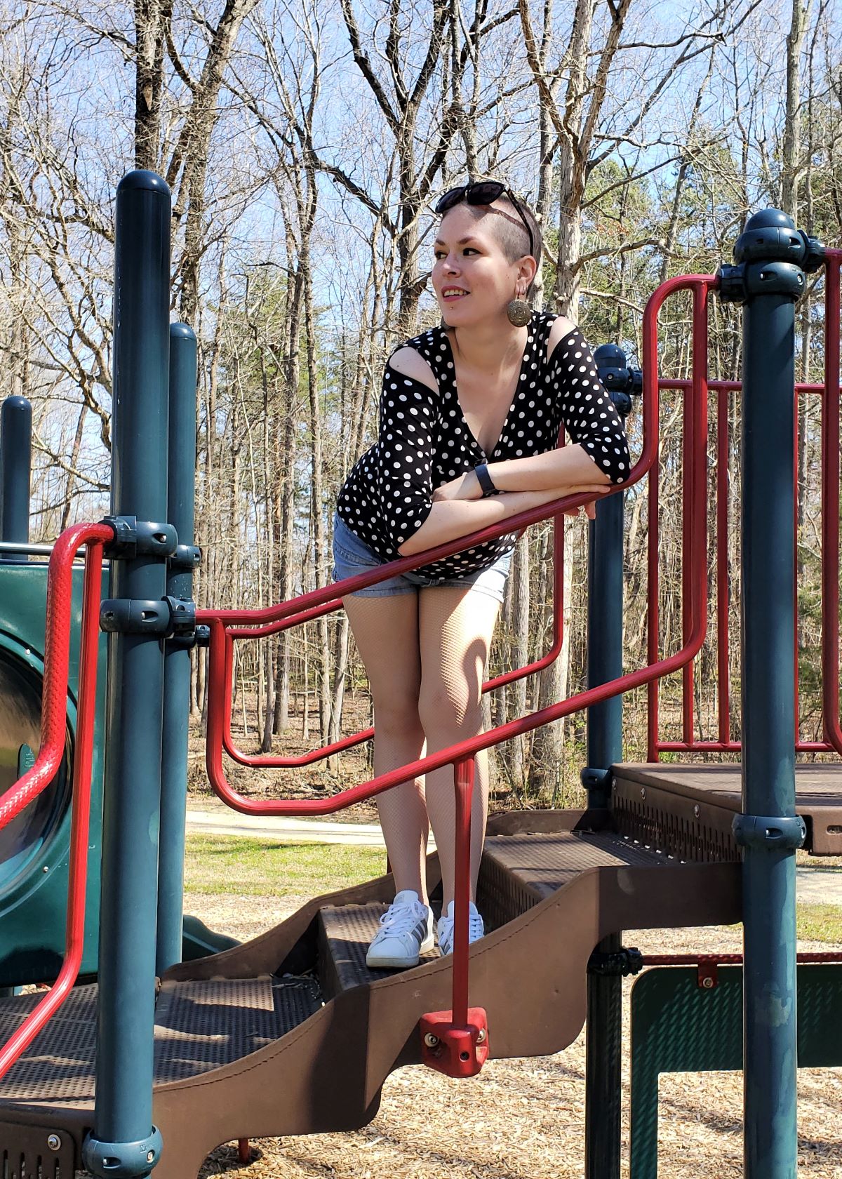 Me goofing off in the Twisted Top at the playground