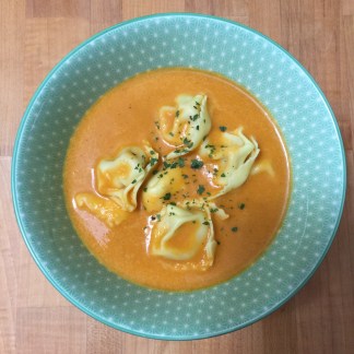 bowl of tomato pesto tortellini soup