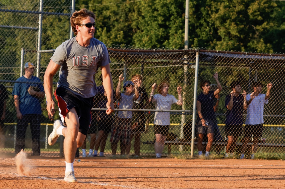 Caption: Sam Moon, a sophomore construction management major, heads toward first base as he hits a good ball toward right field for his team, “Shiesty Denny” during a softball intramurals game. September 2, 2026. (Photo by Ava-Caroline Schmidt)