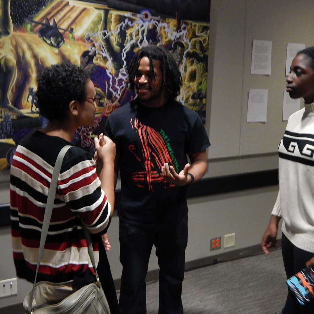 LiFT artist Tim Short discusses his artwork with two event attendees, Gallery 72, Atlanta, Georgia, October 18, 2015. Photograph by Clint Fluker. Courtesy of LiFT Art Salon. LiFT artist Tim Short discusses his artwork with two event attendees, Gallery 72, Atlanta, Georgia, October 18, 2015. Photograph by Clint Fluker. Courtesy of LiFT Art Salon.