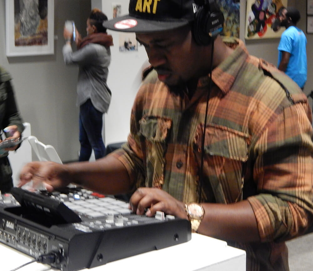 LiFT attendee Mikey P interacts with a series of beat machines from different eras of hip hop, Gallery 72, Atlanta, Georgia, October 18, 2015. Photograph by Clint Fluker. Courtesy of LiFT Art Salon. LiFT attendee Mikey P interacts with a series of beat machines from different eras of hip hop, Gallery 72, Atlanta, Georgia, October 18, 2015. Photograph by Clint Fluker. Courtesy of LiFT Art Salon.