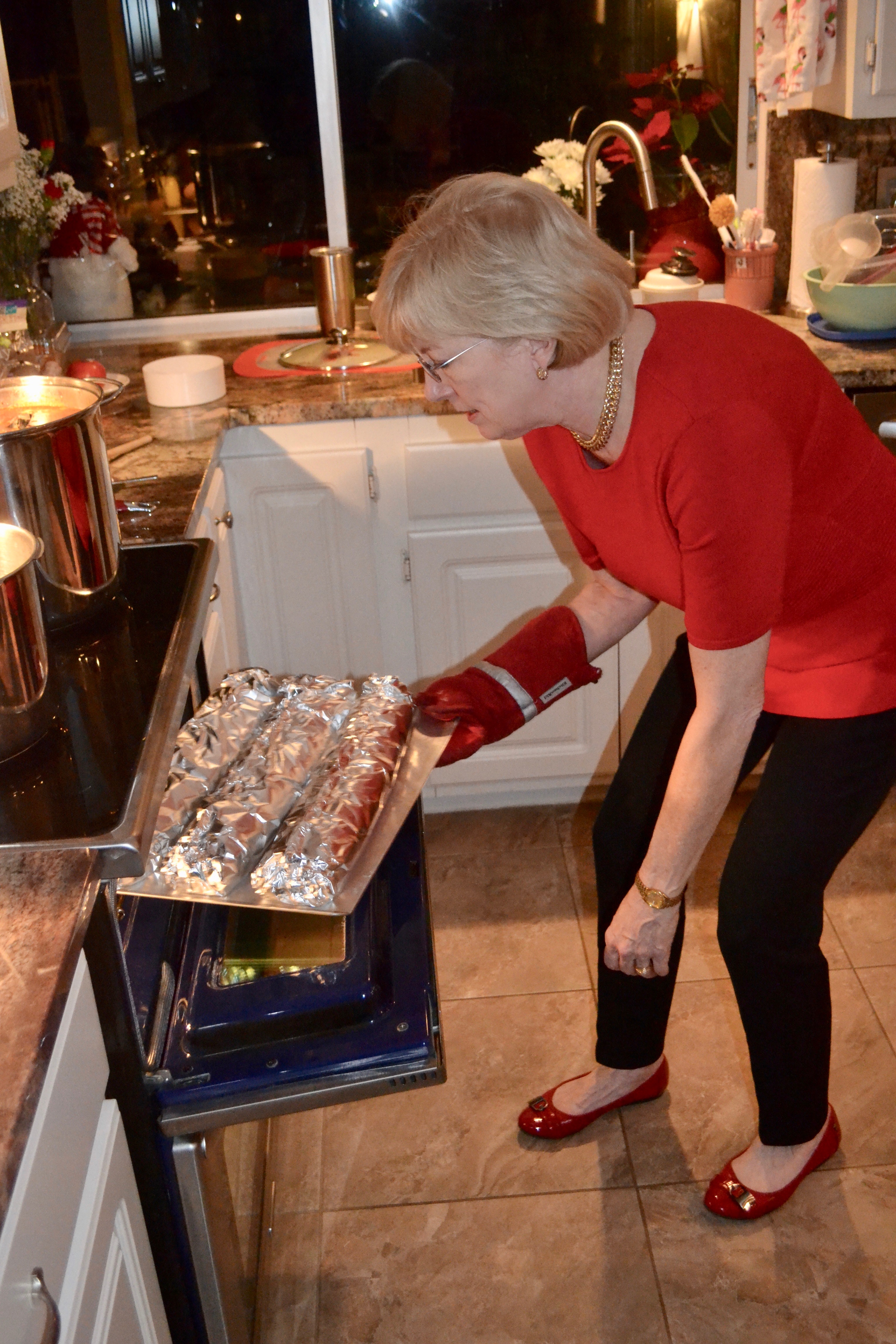 My sis with the bread, and even the hot pad is color coordinated!