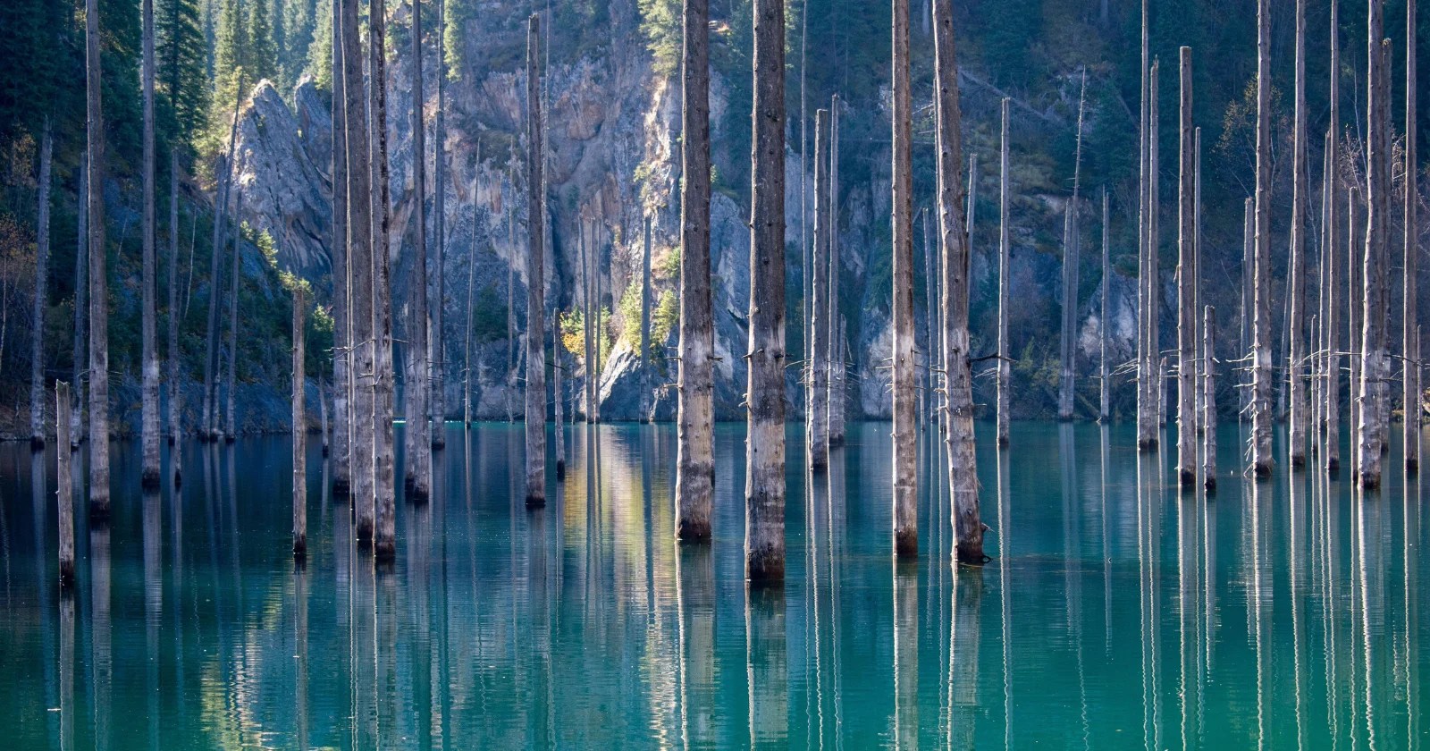 The Eerie Secret of Kazakhstan's Turquoise Lake: A Forest's Legacy (2026)