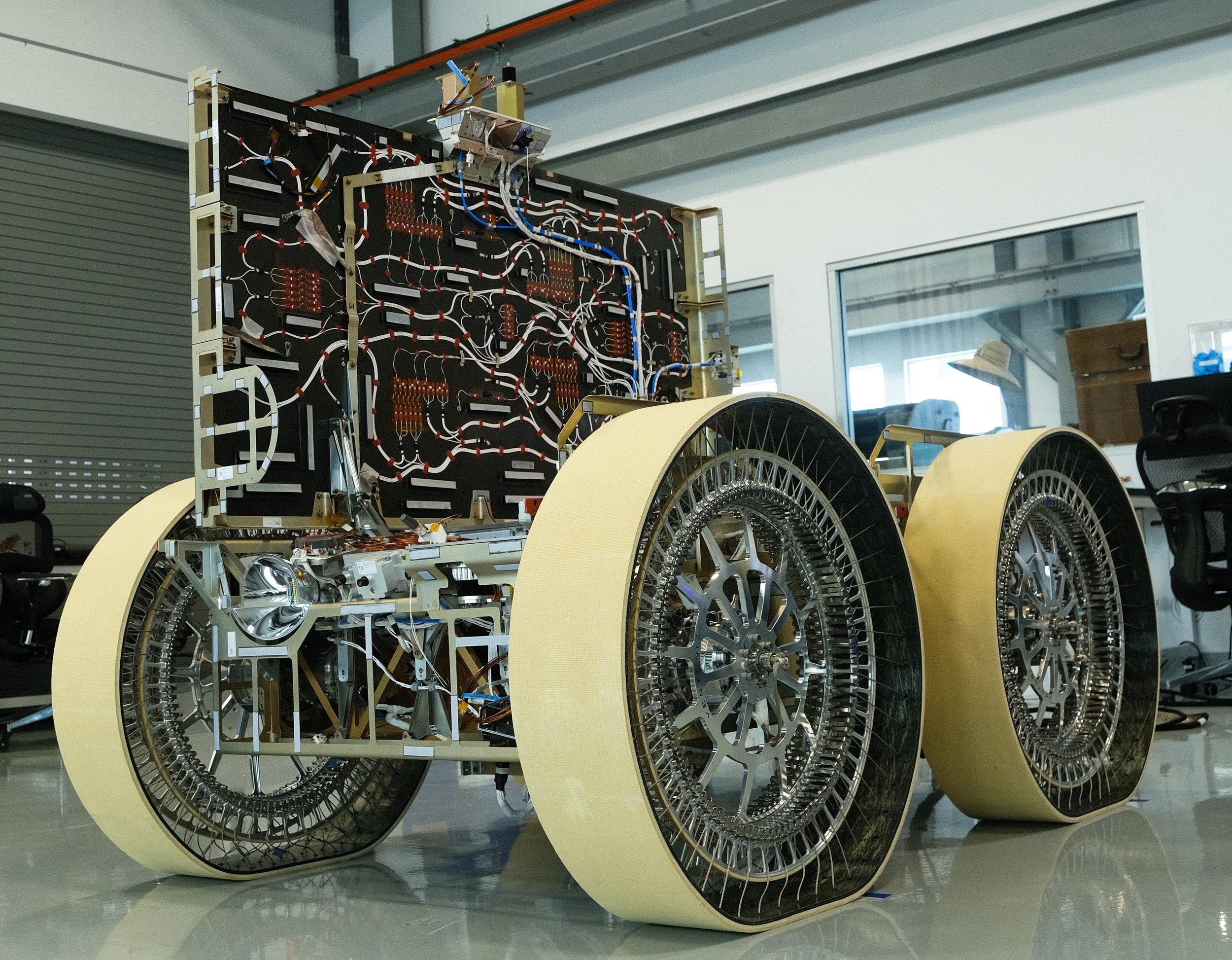 Astrolab’s FLIP rover is shown at the company’s headquarters in Hawthorne, California. FLIP will carry payloads from four NASA centers to the Moon’s south pole aboard Astrobotic’s Griffin-1 lander as part of NASA’s Commercial Lunar Payload Services initiative. The mission is slated for launch in late 2026. Credit: Astrolab