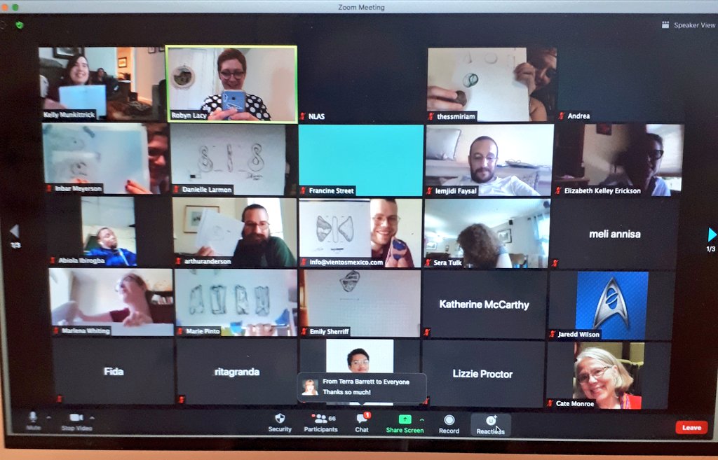 Some of our participants holding up their finished drawings!