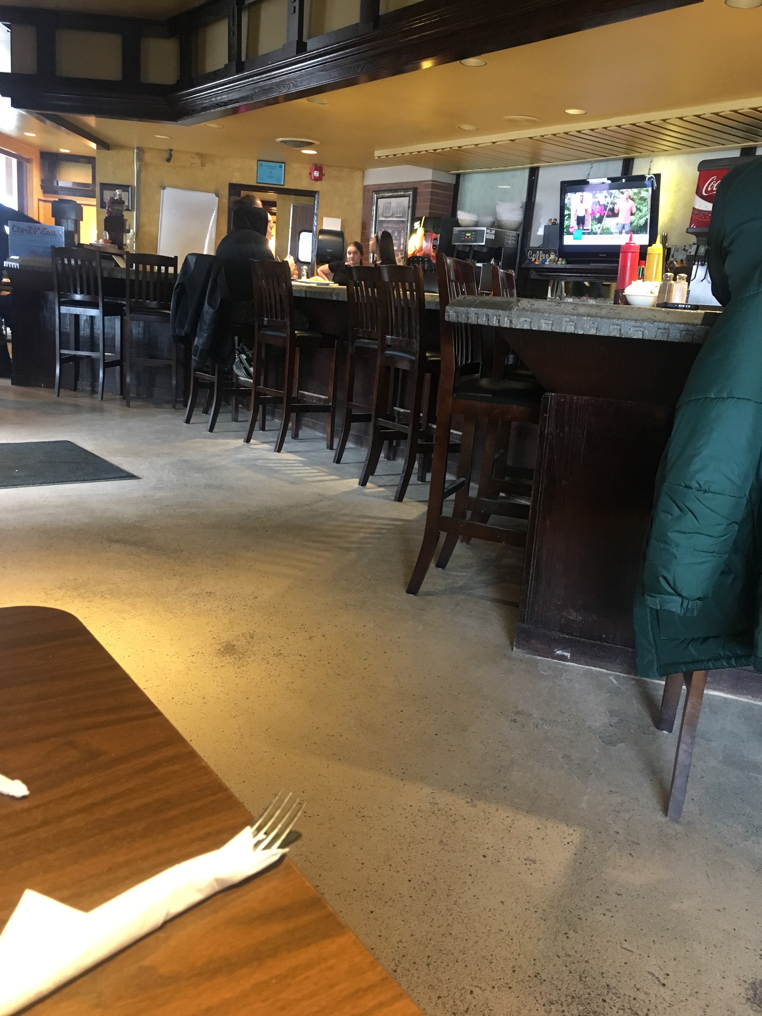 T & D Coney Grill's interior is spacious with plenty of seating at the front counter. Photo by Jamal Tyler.