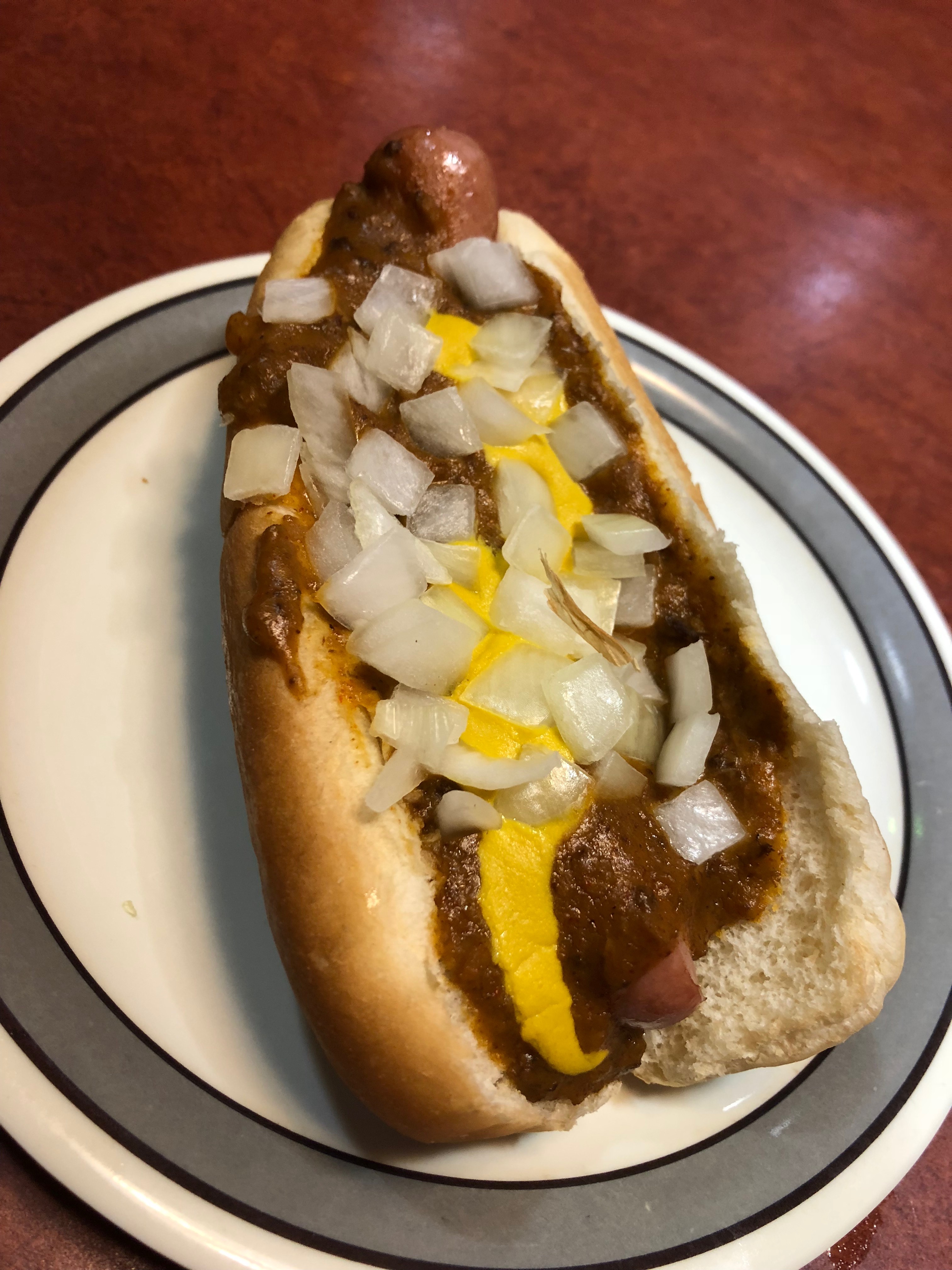 Pictured here is Leo's Coney Island classic coney with chili, mustard and onions. Photo by Erika Greco.