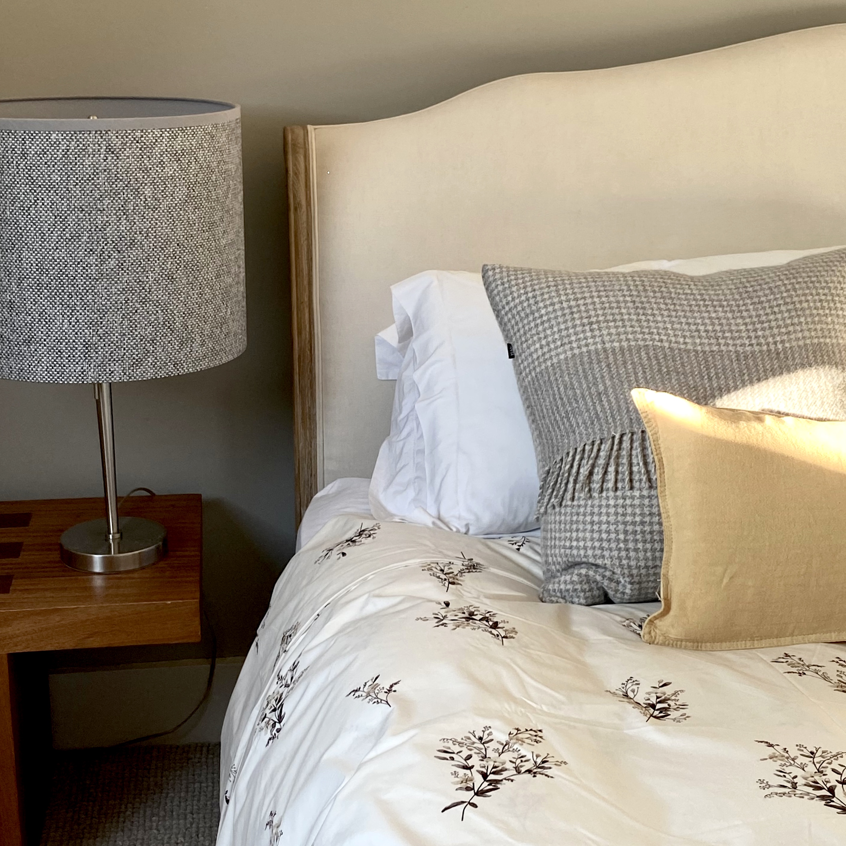 Crisp cotton bedding and cozy pillows.