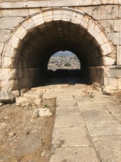 This image has an empty alt attribute; its file name is Roman-arch-rotated.jpeg