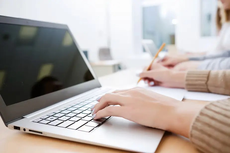 laptop and writing