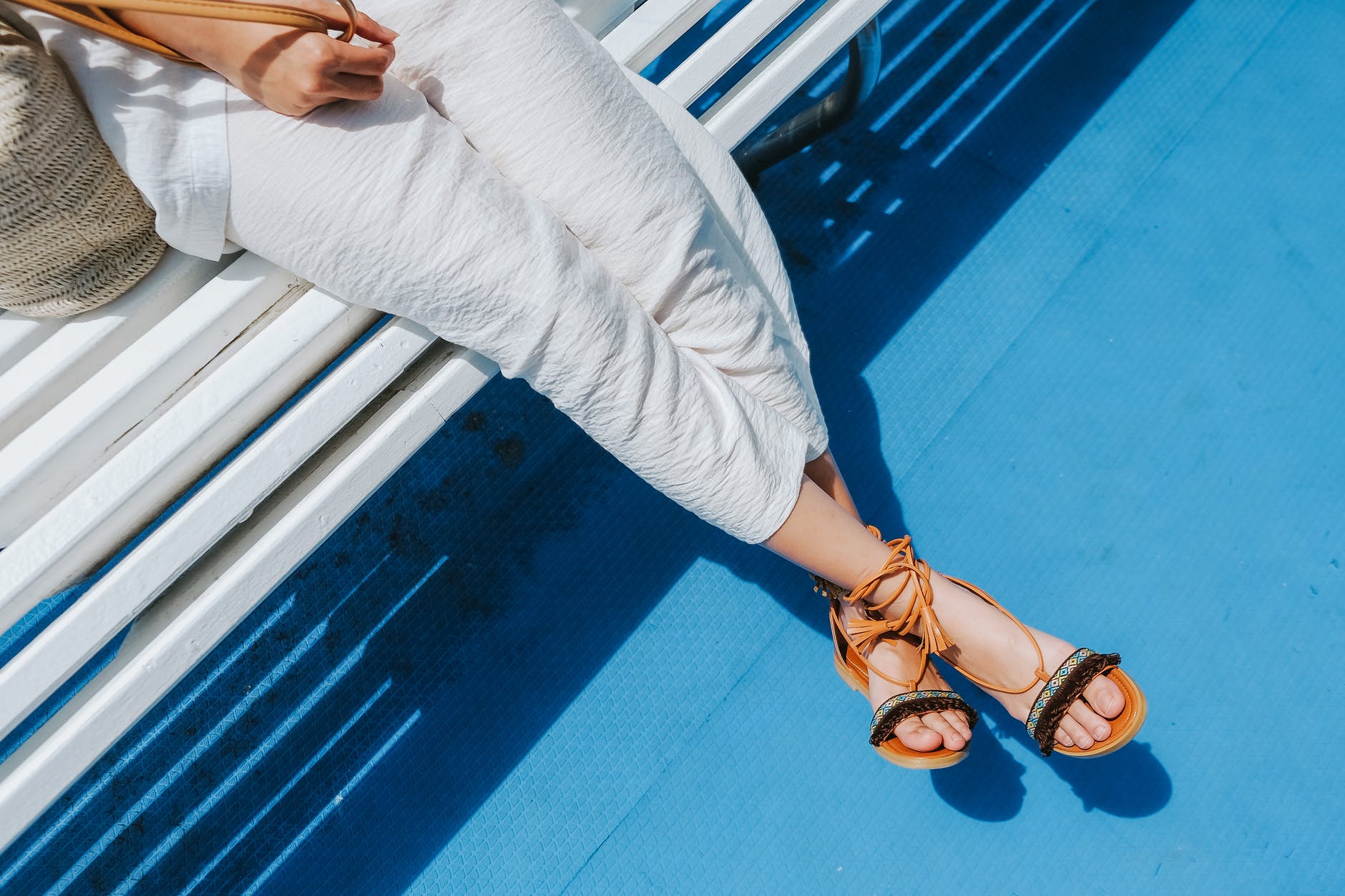 woman wearing white pants