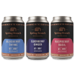 A variety 12-pack of Spring Branch Kombucha featuring the Berry Trio with three flavors: Blueberry Thyme, Elderberry Ginger, and Raspberry Basil. Each can has unique color accents to represent its flavor.