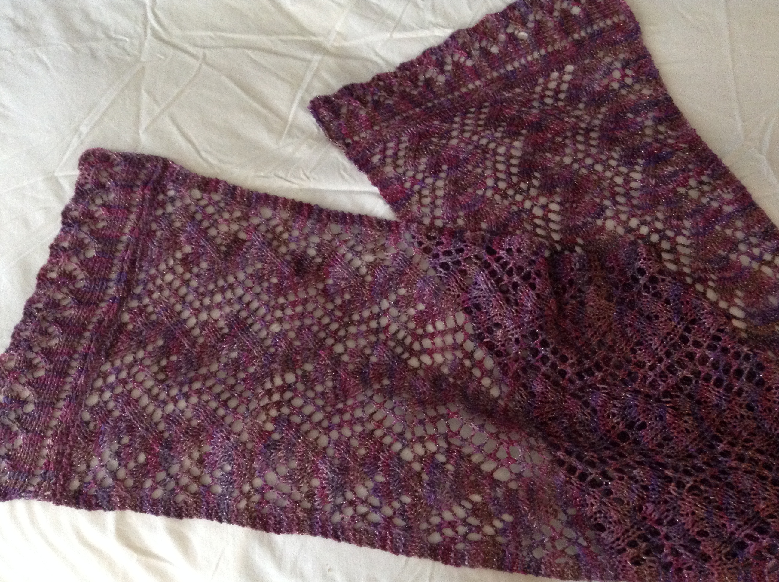 Scarf/shawl: Elaborated Print O' the Wave pattern by Eunny Jang, from her Craftsy class "Lace Knitting: Basics and Beyond". Yarn is Interlacements Irish Jig [African Violets].