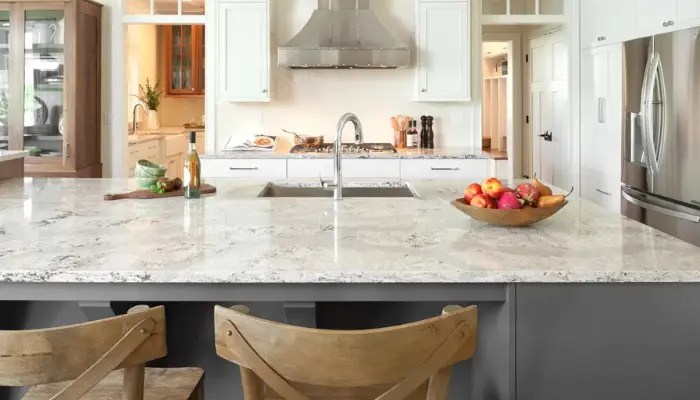 Quartz kitchen countertops with large island and integrated sink by Stone & Style Kitchen Design in Old Bridge, NJ