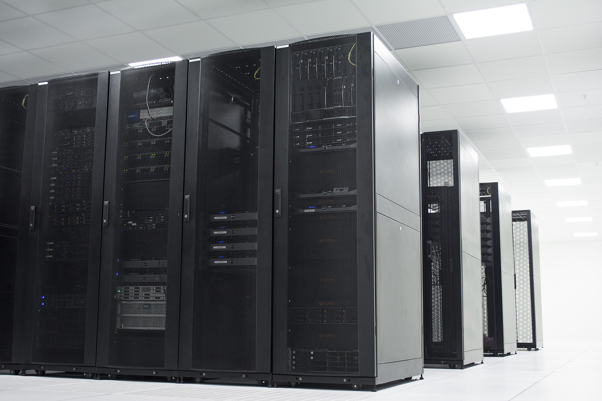 Server racks representing infrastructure behind website traffic exchange and traffic generator systems