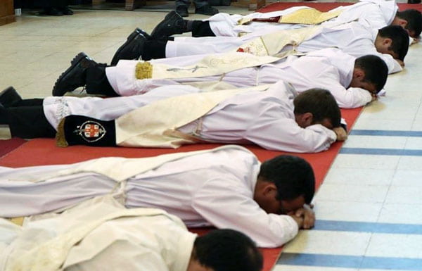 priest-ordination-stock-min