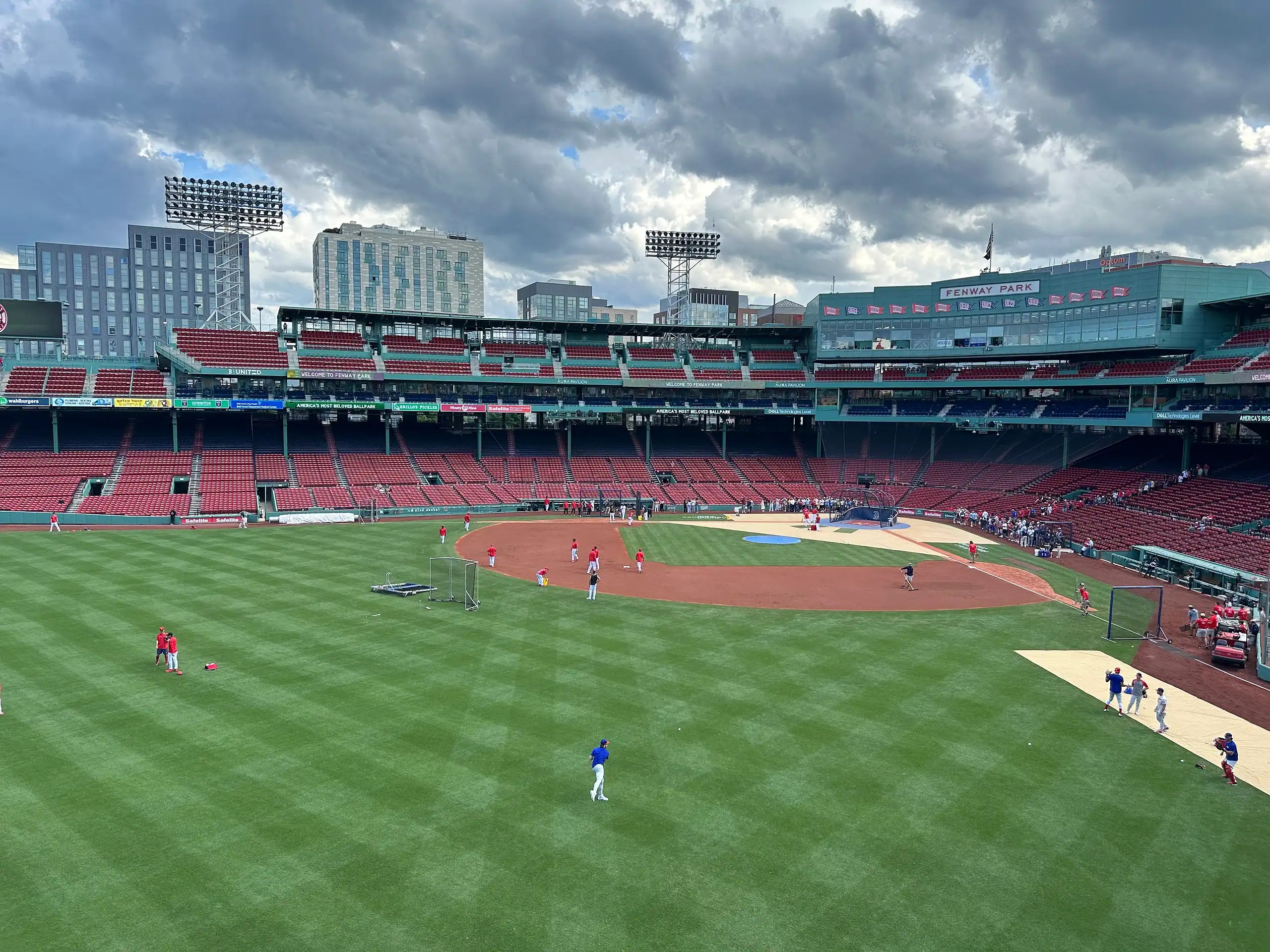 Boston Harbor skyline at sunset with boats docked along the waterfront — the perfect family-friendly start to 3 days in Boston with tweens and teens.