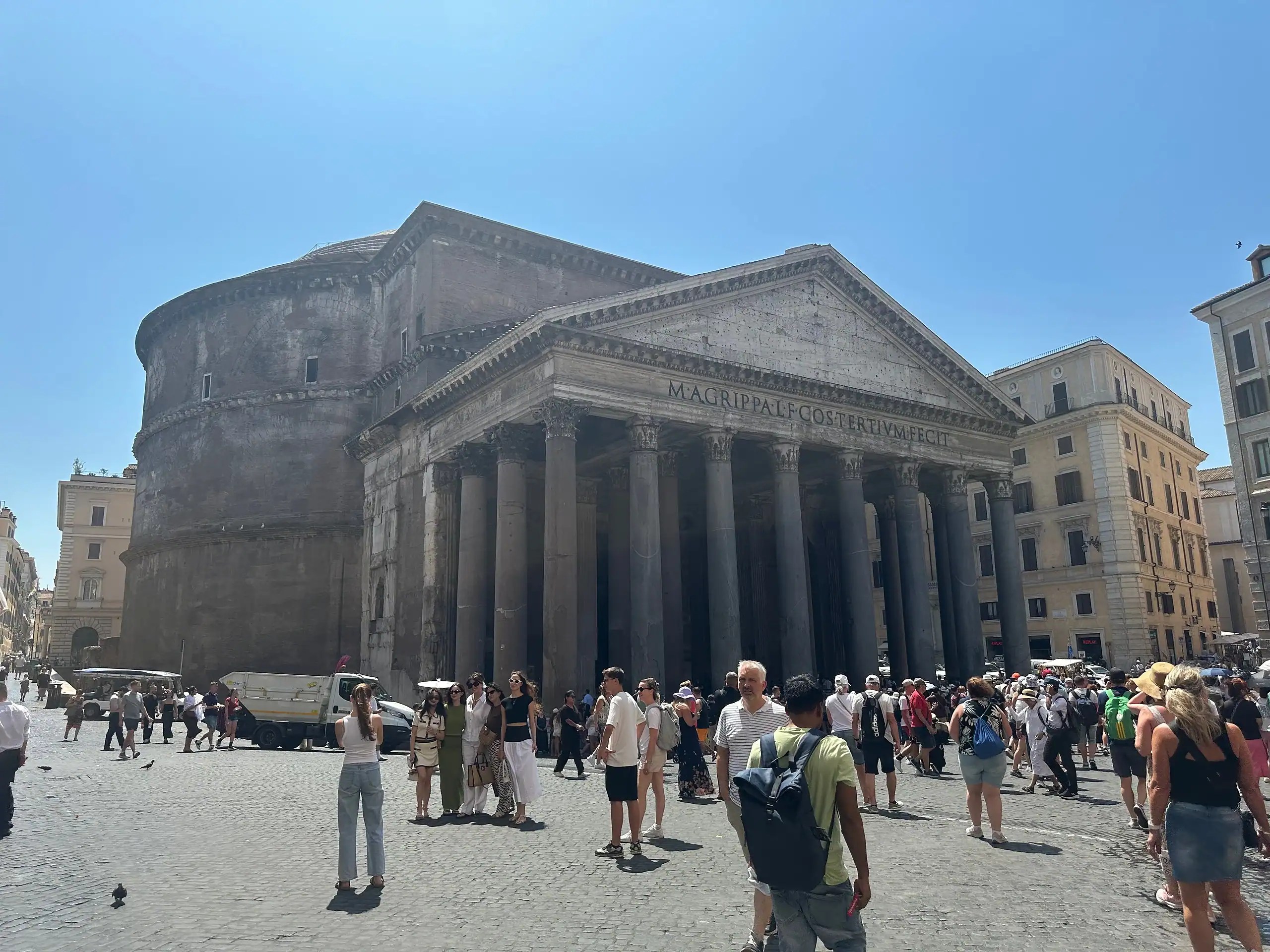 Crowds of tourists walking near the Pantheon in Rome, showing what getting around Rome with kids is like in busy summer months