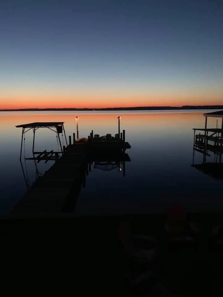 Quiet lake views at sunset, a peaceful way families unwind during a Cooperstown bucket list tournament week