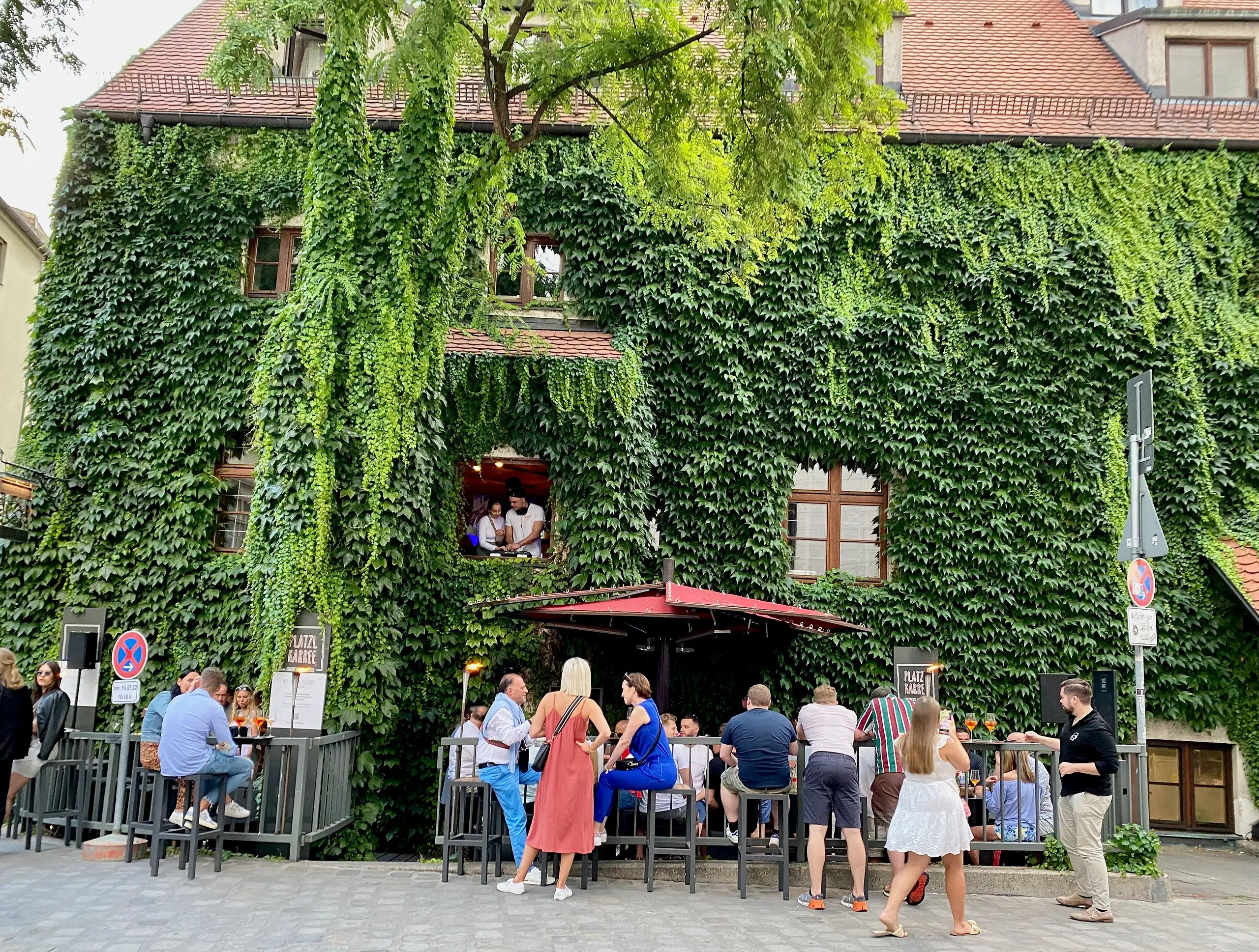 Munich travel tips ivy covered restaurant in Old Town Bavaria.