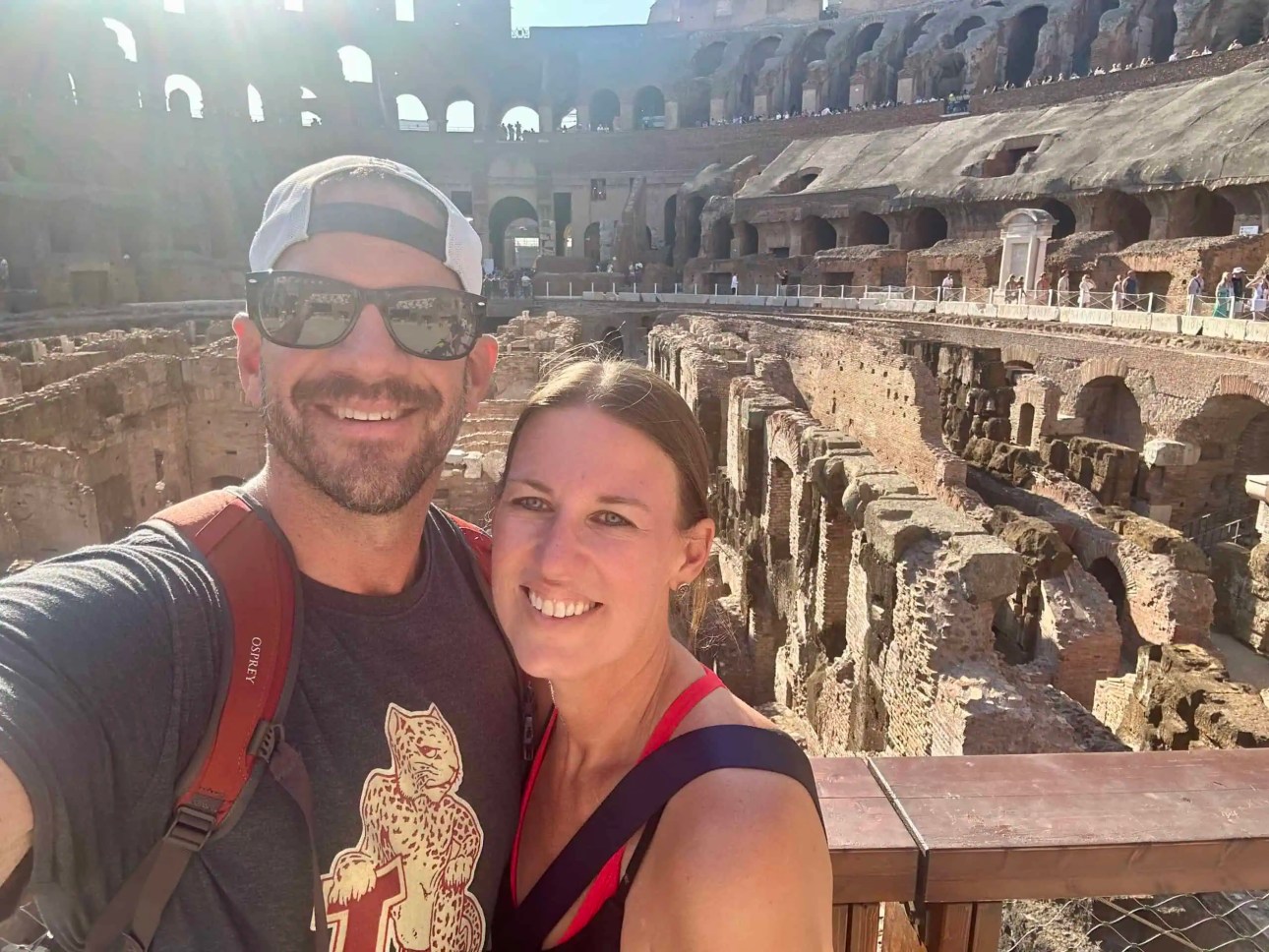 Wearing a Lululemon Everywhere Belt Bag while sightseeing inside the Colosseum in Rome